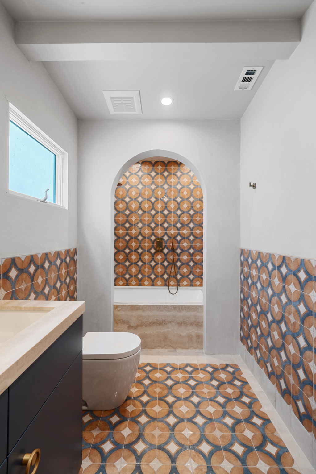 Arched shower entrance in Manhattan Beach luxury interior remodel bathroom
