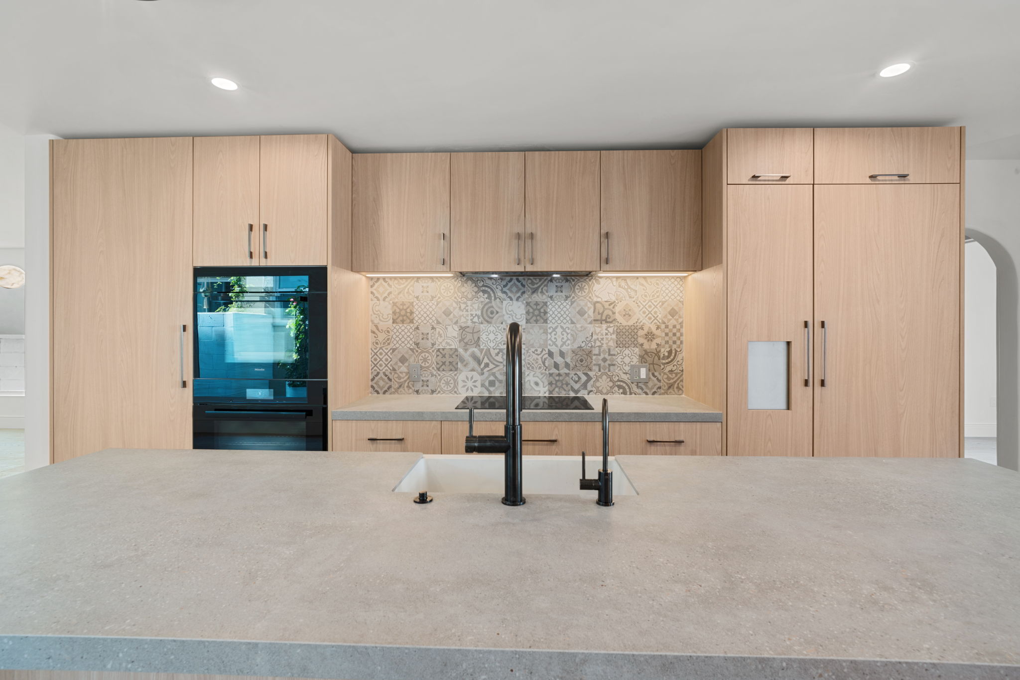 Modern Spanish-style kitchen in luxury Manhattan Beach interior remodel