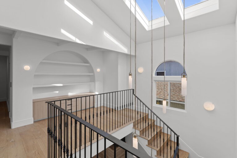 Modern Spanish-style stairwell in Manhattan Beach luxury interior remodel