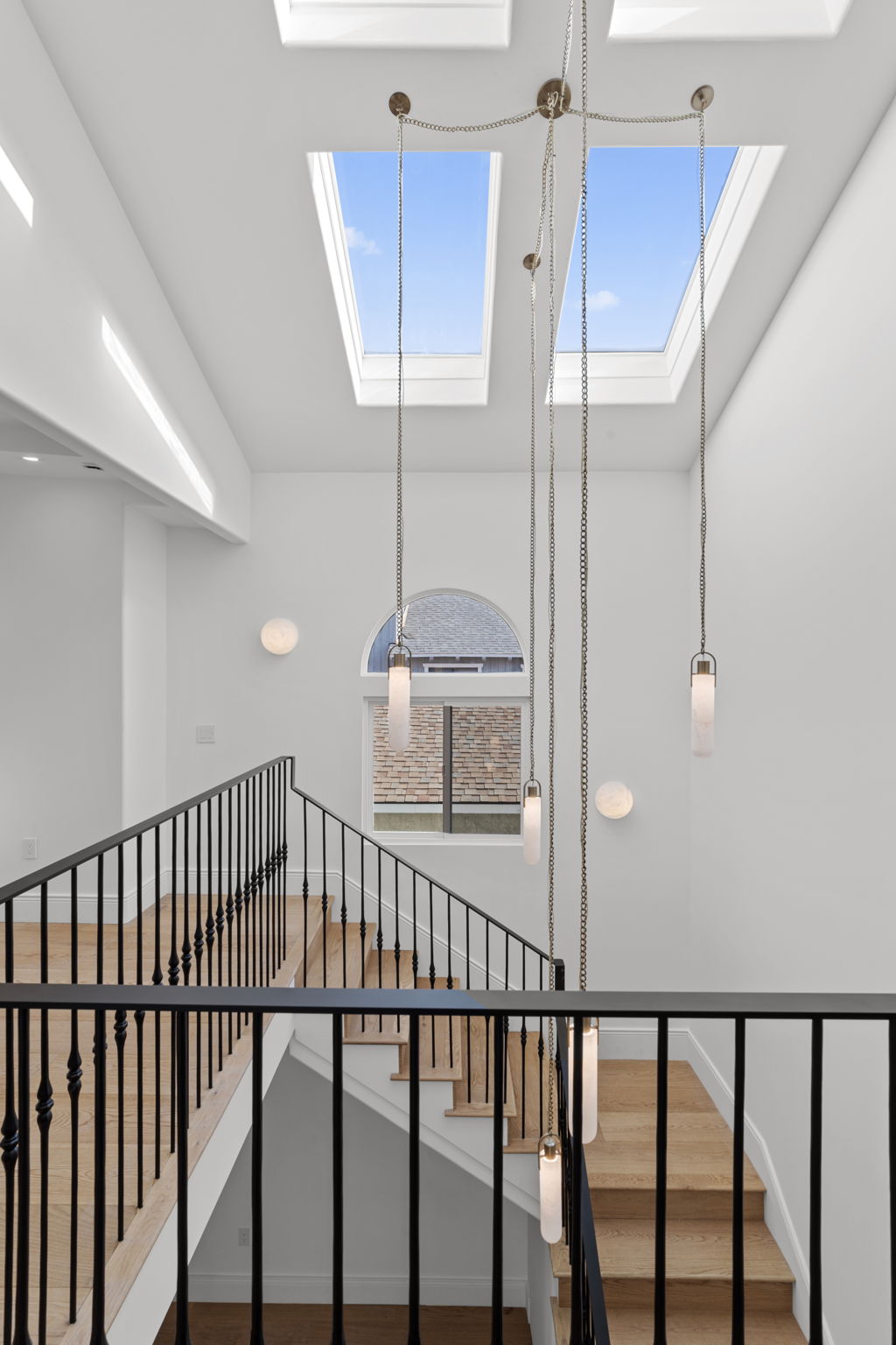 Modern Spanish-style stairwell in Manhattan Beach luxury interior remodel