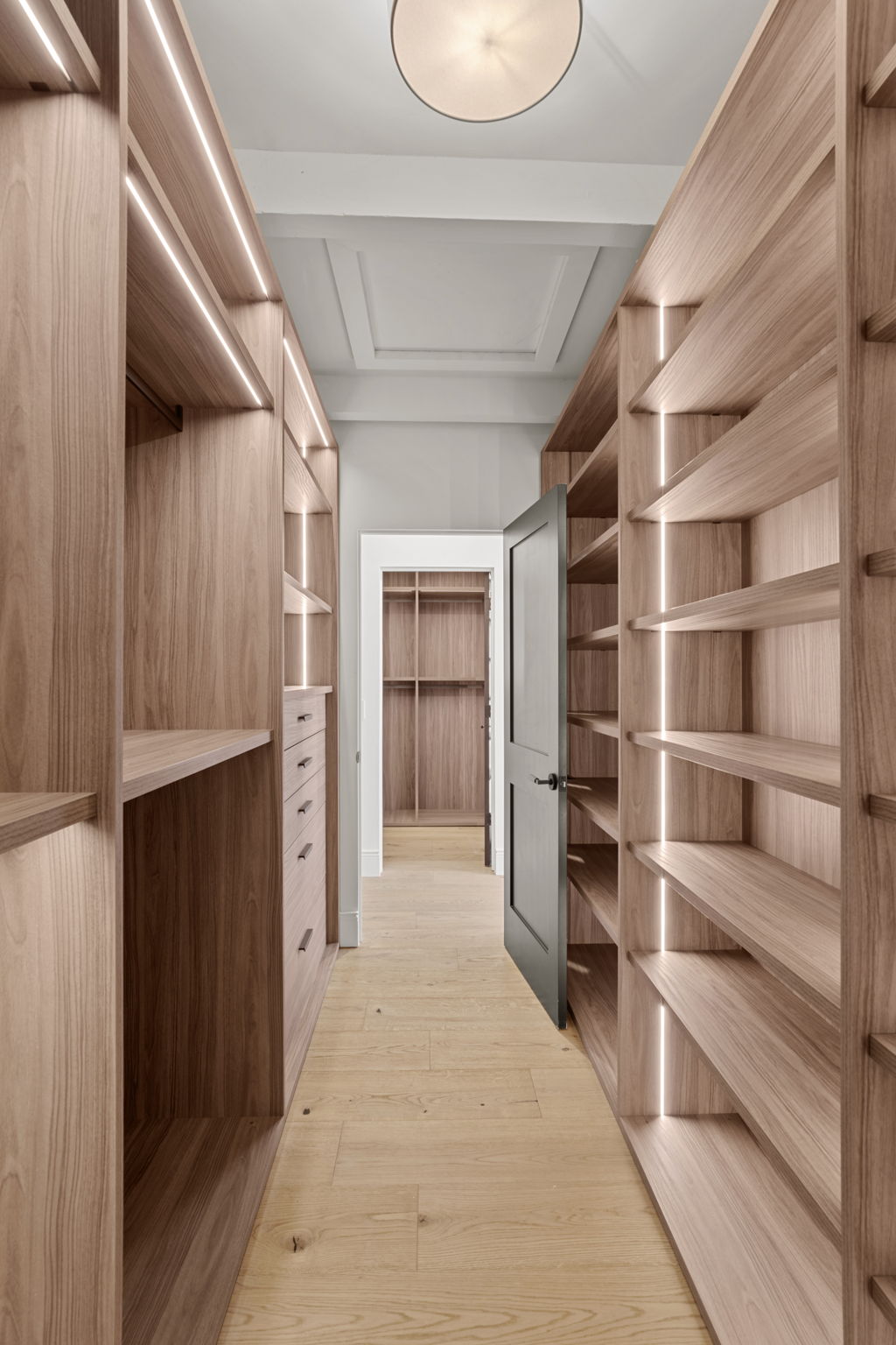 Built-in storage with integrated lighting in Manhattan Beach luxury remodel